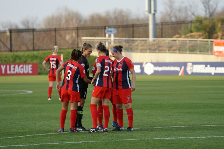 Sports team in a huddle